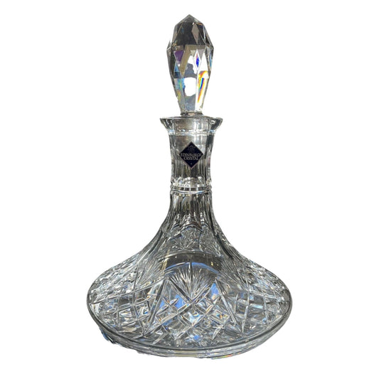 Crystal Edinburgh crystal decanter with a decorative stopper on a white background