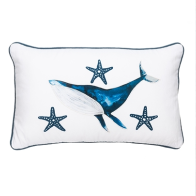 White Cushion with a whale surrounded by starfish