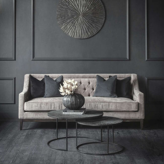 Woven Fabric Taupe Sofa with Button Detailing, Chesterfield Style In room with grey walls 