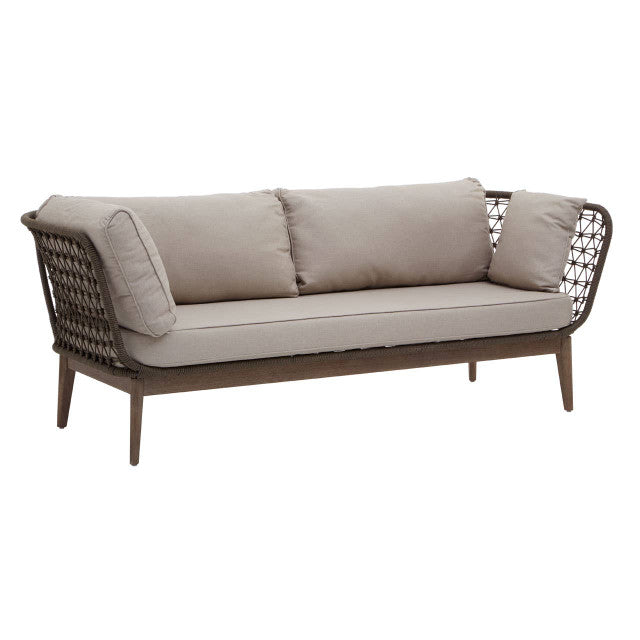 Beige outdoor sofa with wicker frame on a white background