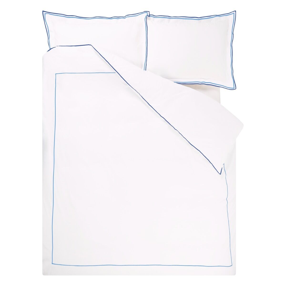 White bedspread with blue piping and matching pillows on a white background