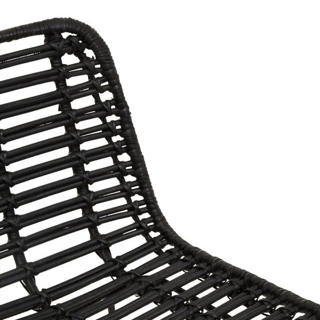 Black wicker chair on a white background
