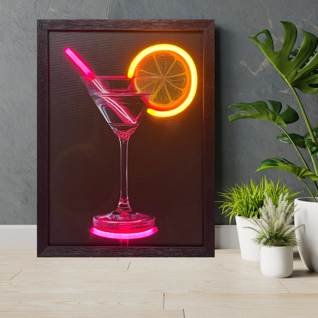 Neon sign of a cocktail glass with a slice of lemon on a dark background, placed indoors.