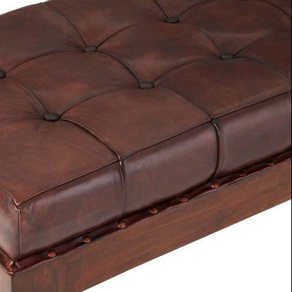 Brown leather bench with wooden frame on a white background