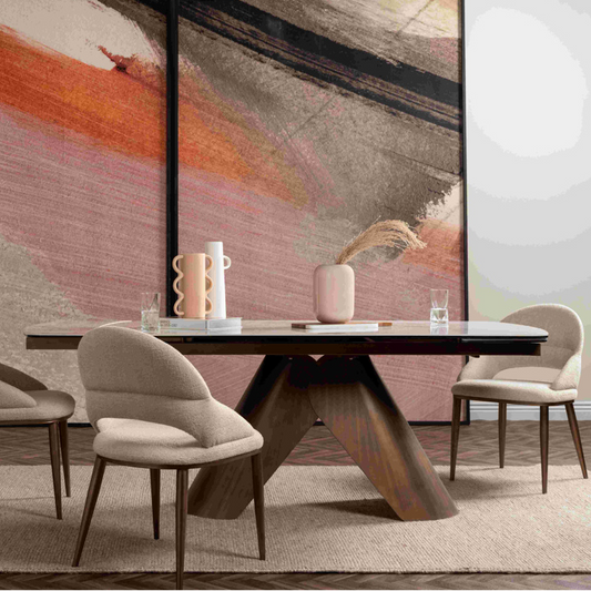 Dining room with a large abstract painting on the wall and a wooden table with chairs.