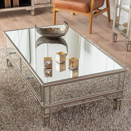 Decorative coffee table with a reflective surface in a living room setting