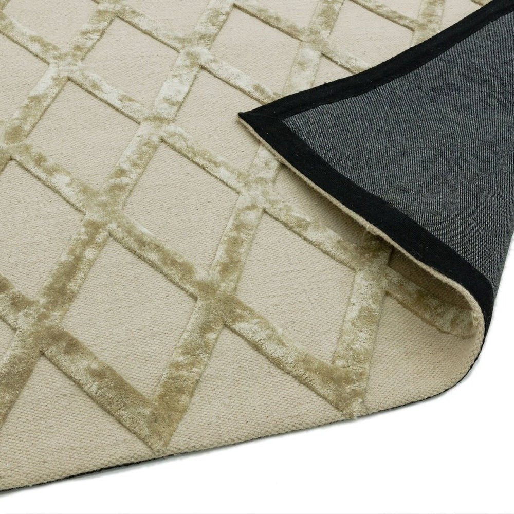 Close-up of a textured beige rug with geometric pattern