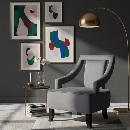 Modern living room with gray armchair, abstract art, and gold floor lamp.