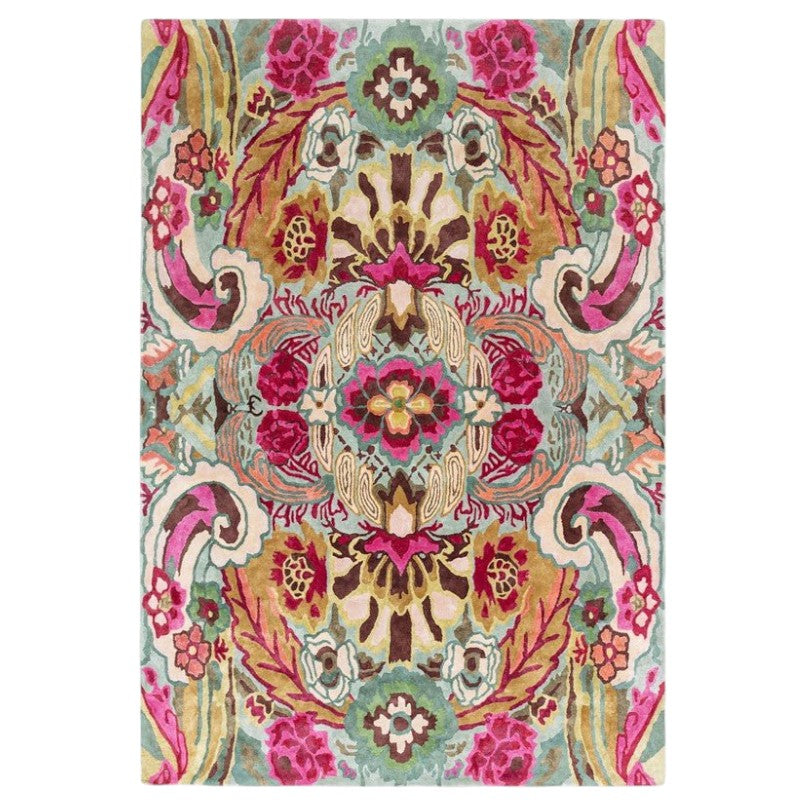 Colorful floral and paisley patterned rug on a white background