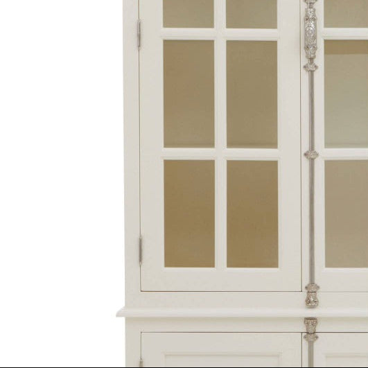 White cabinet with glass doors on a white background