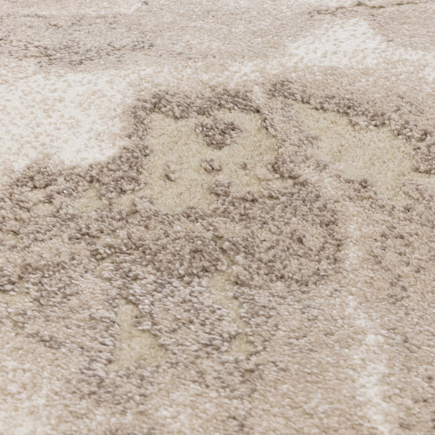 Close-up of a textured beige carpet