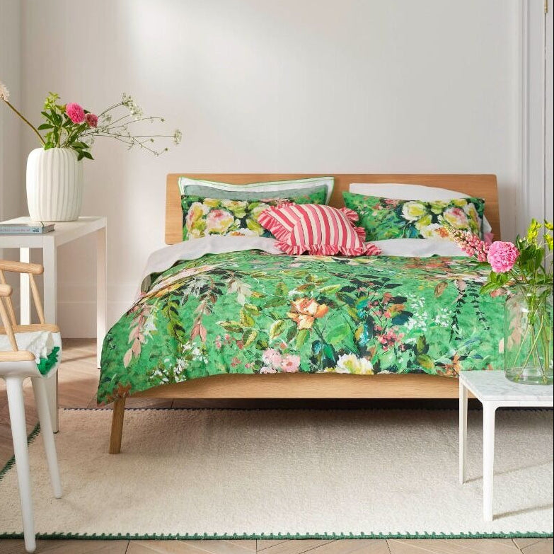 Bedroom with floral bedding and decor