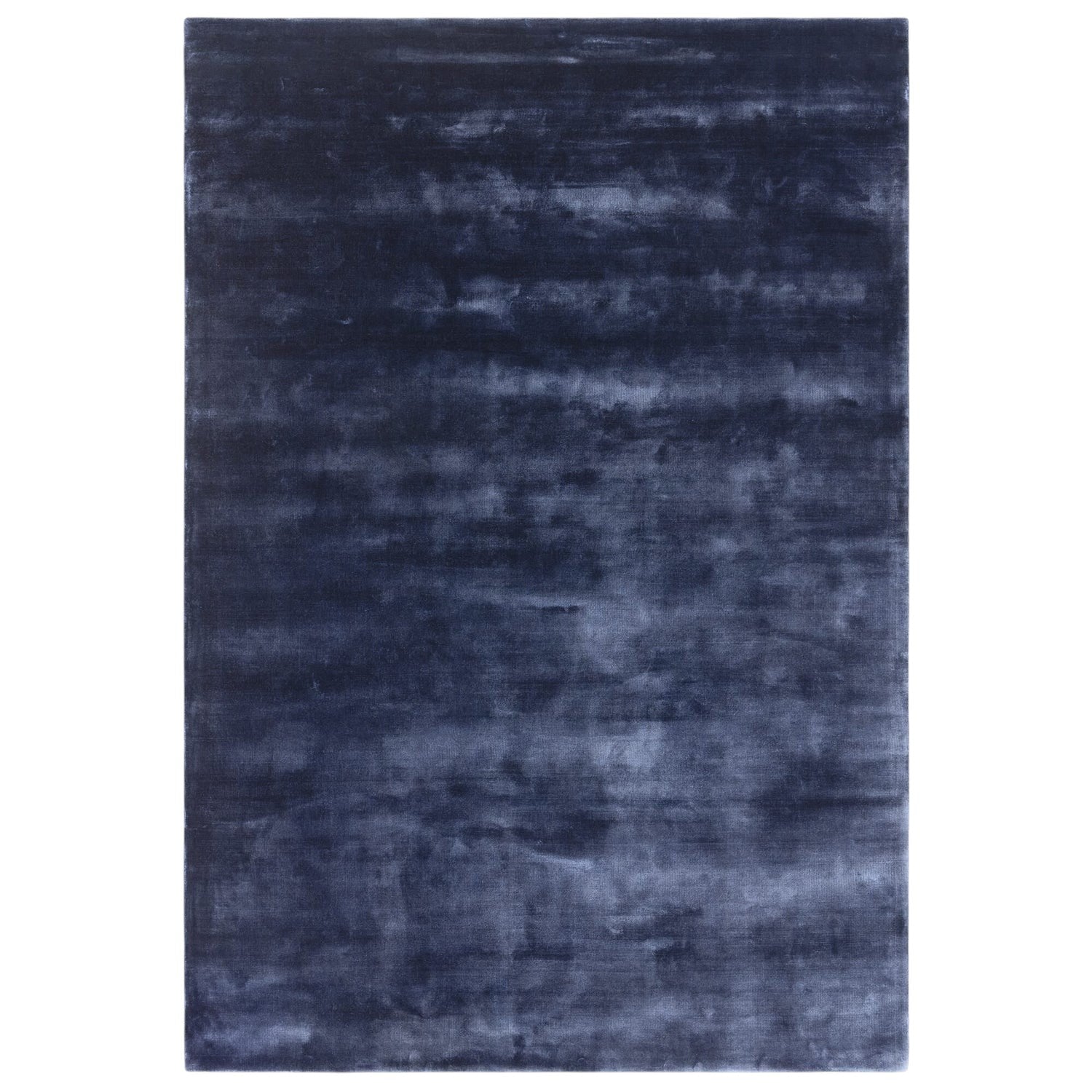 Navy blue textured rug on a white background