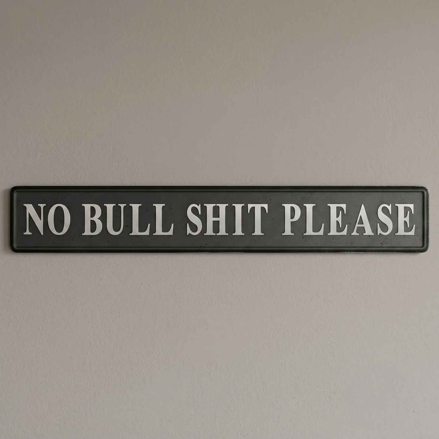 Black and Silver 'No Bullsh*t Please' Sign