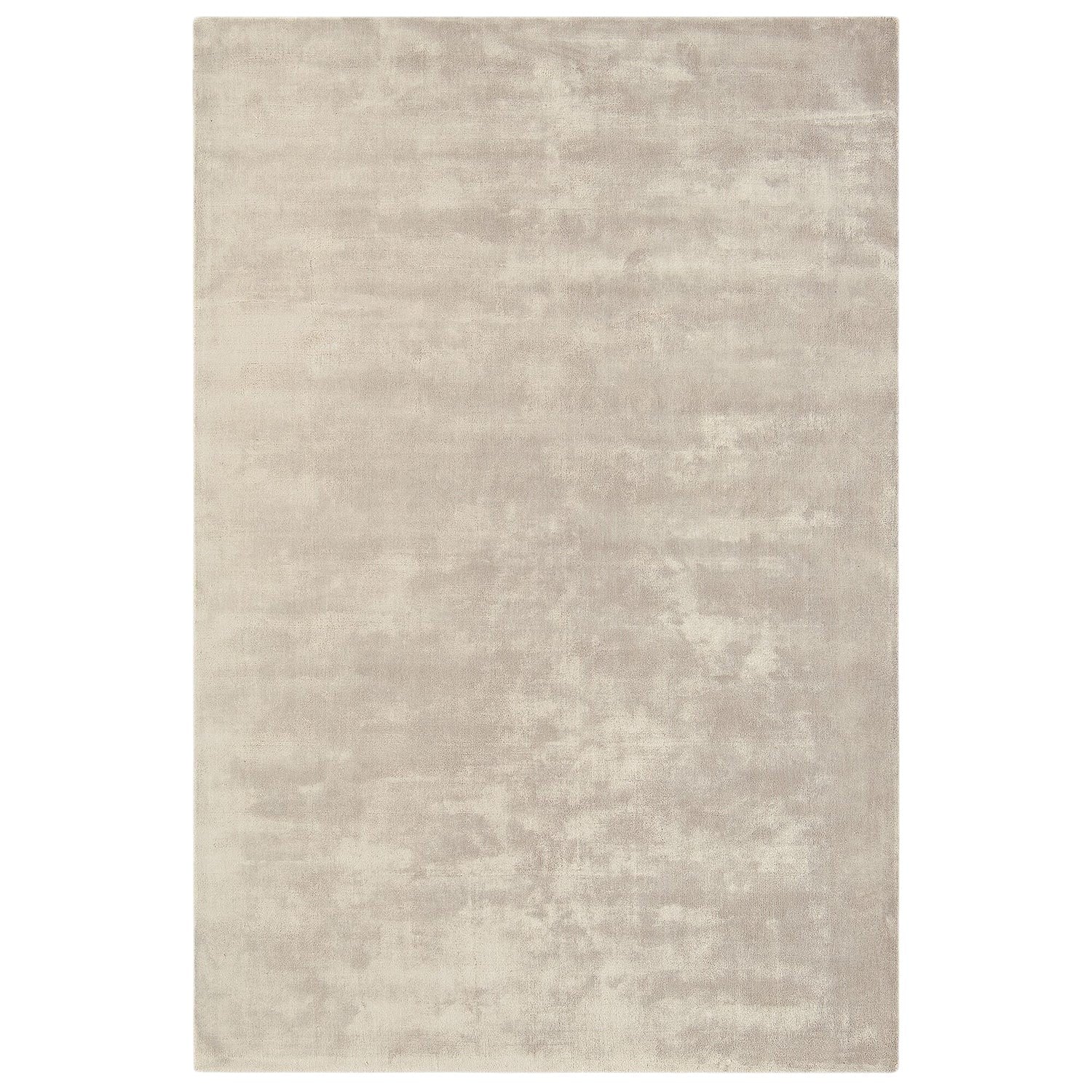 Beige area rug on a white background
