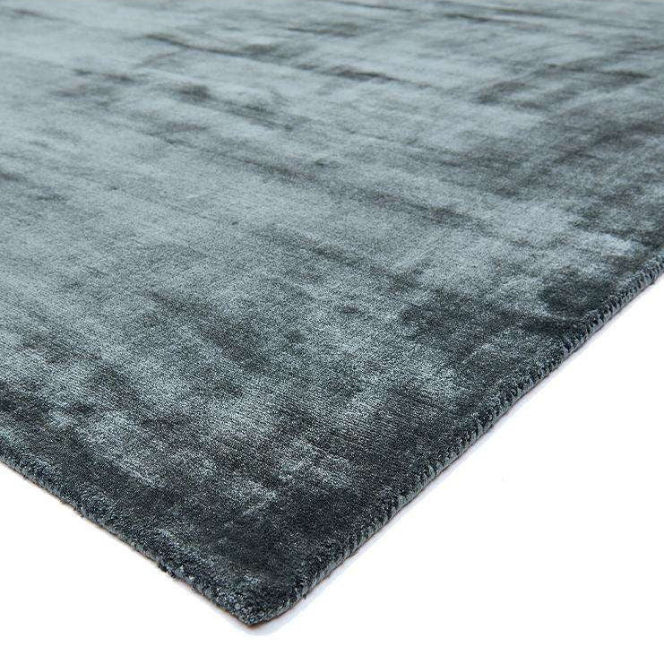 teal rug on a white background