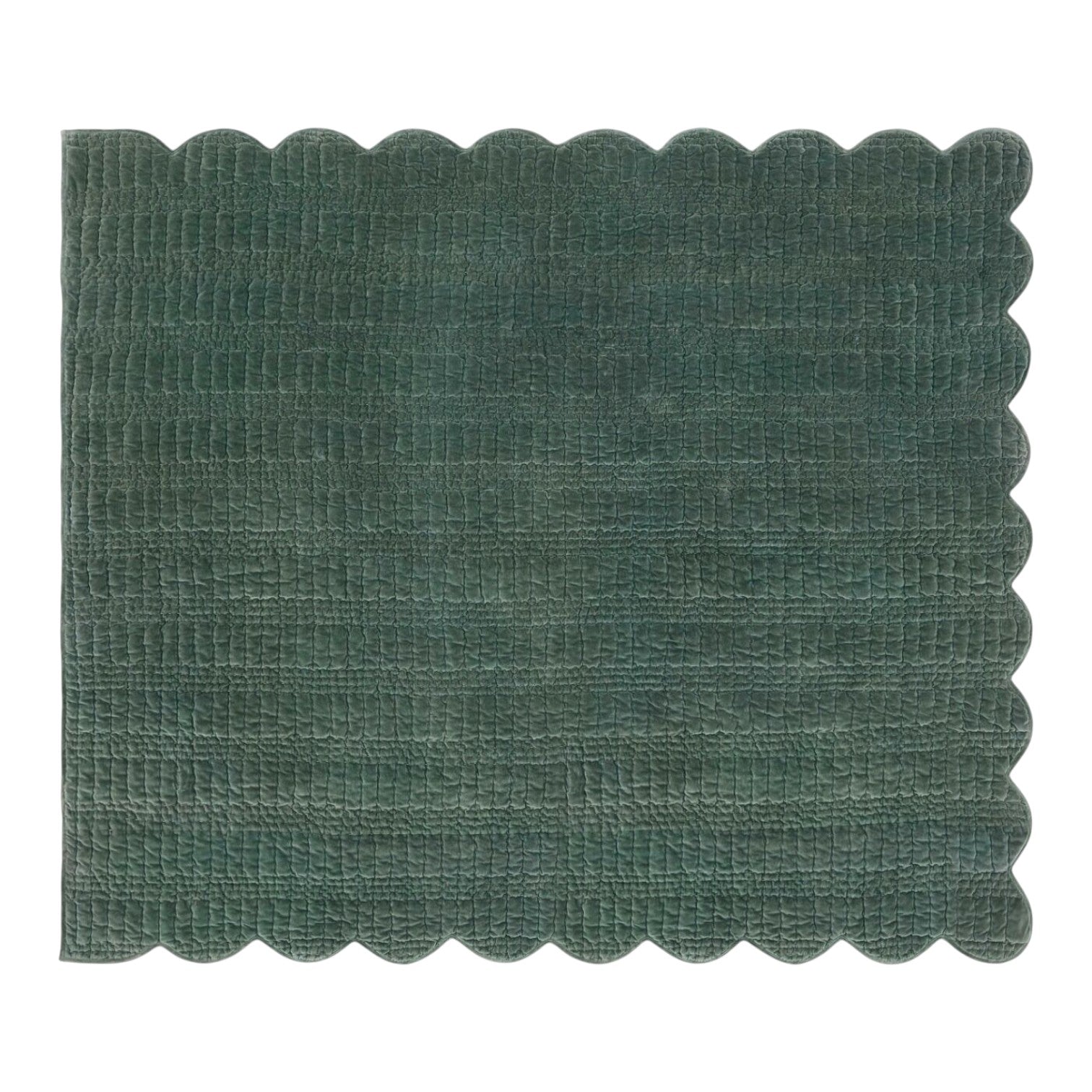 Green scalloped placemat on a white background