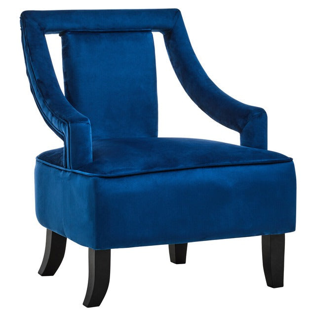Blue velvet armchair on a white background