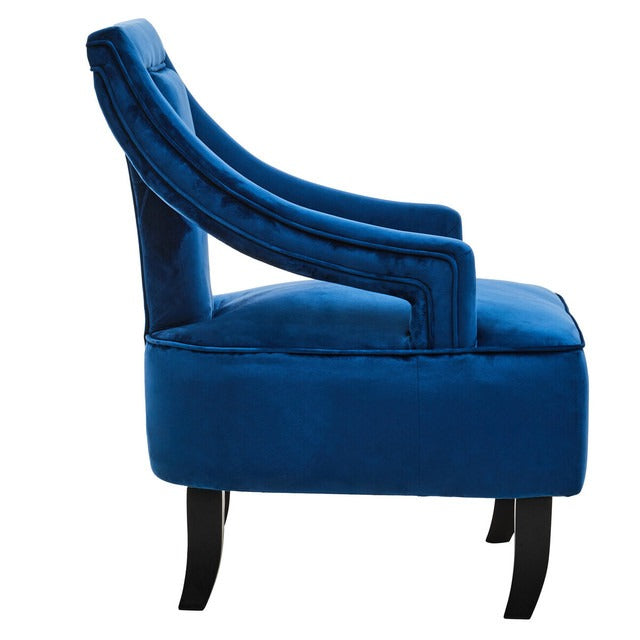 Blue velvet armchair on a white background